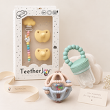 Baby Essentials Gift Set – Pacifiers & Clip, Food Feeder & Montessori Rattle Ball (Nationwide Delivery)