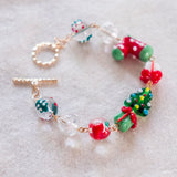 Joyful Twinkling Winky Christmas Handmade Gold Bracelet