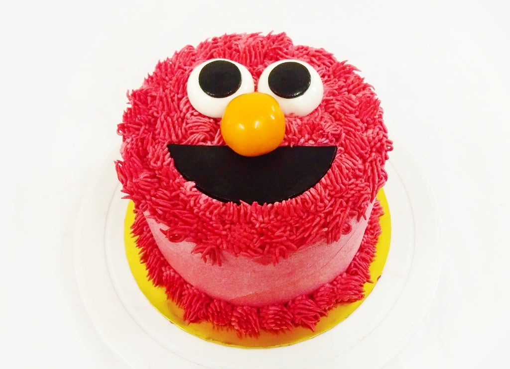 Red Monster TV Show Character Cake