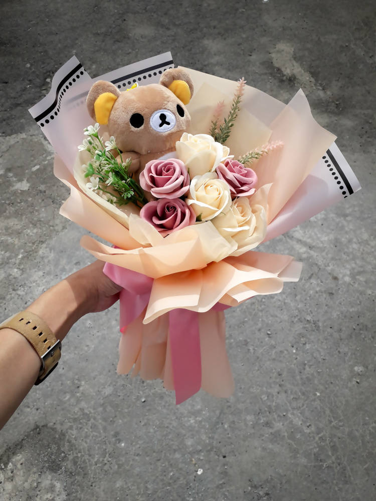 Teddy bear with rose hot sale bouquet