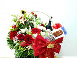 Merry Christmas Gift Basket (Wine, Chocolates, Candies & Flowers)